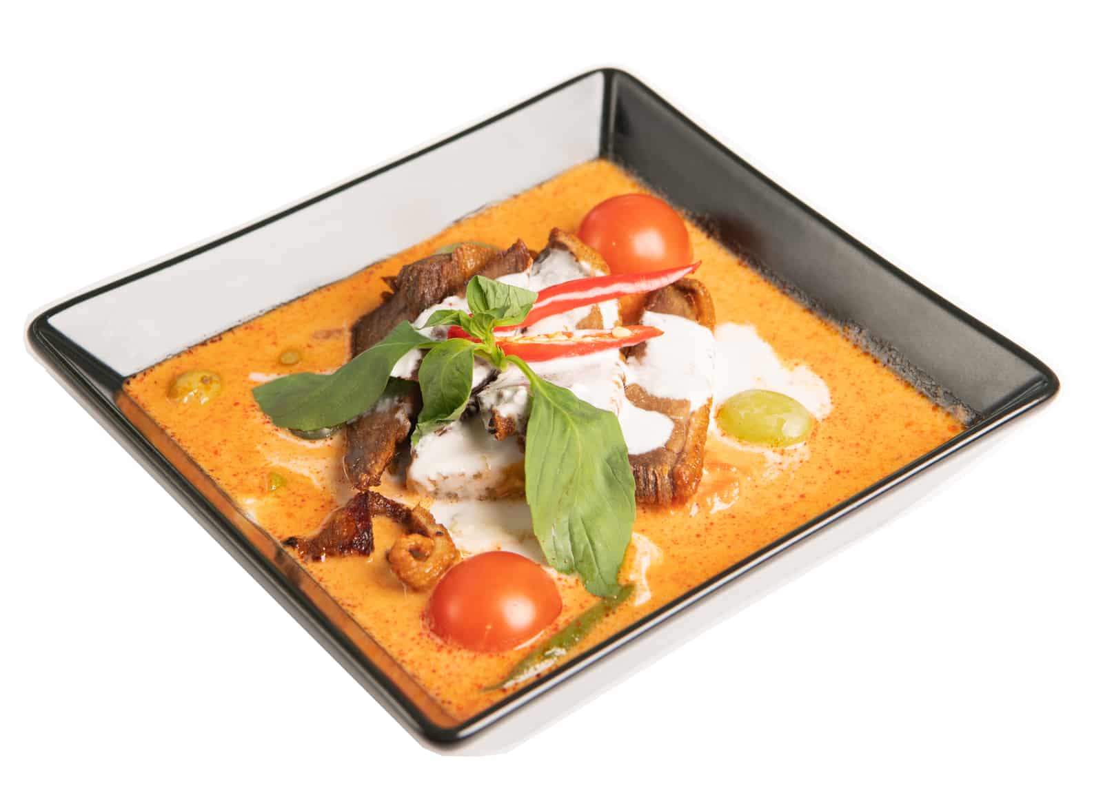 Rotes Thai-Curry mit Ente, Gemüse, Kokosmilch und Kräutern